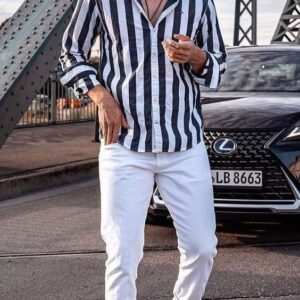 Men’s Black and White Striped Shirt with White Jeans – Trendy Street Style Look for Modern Men